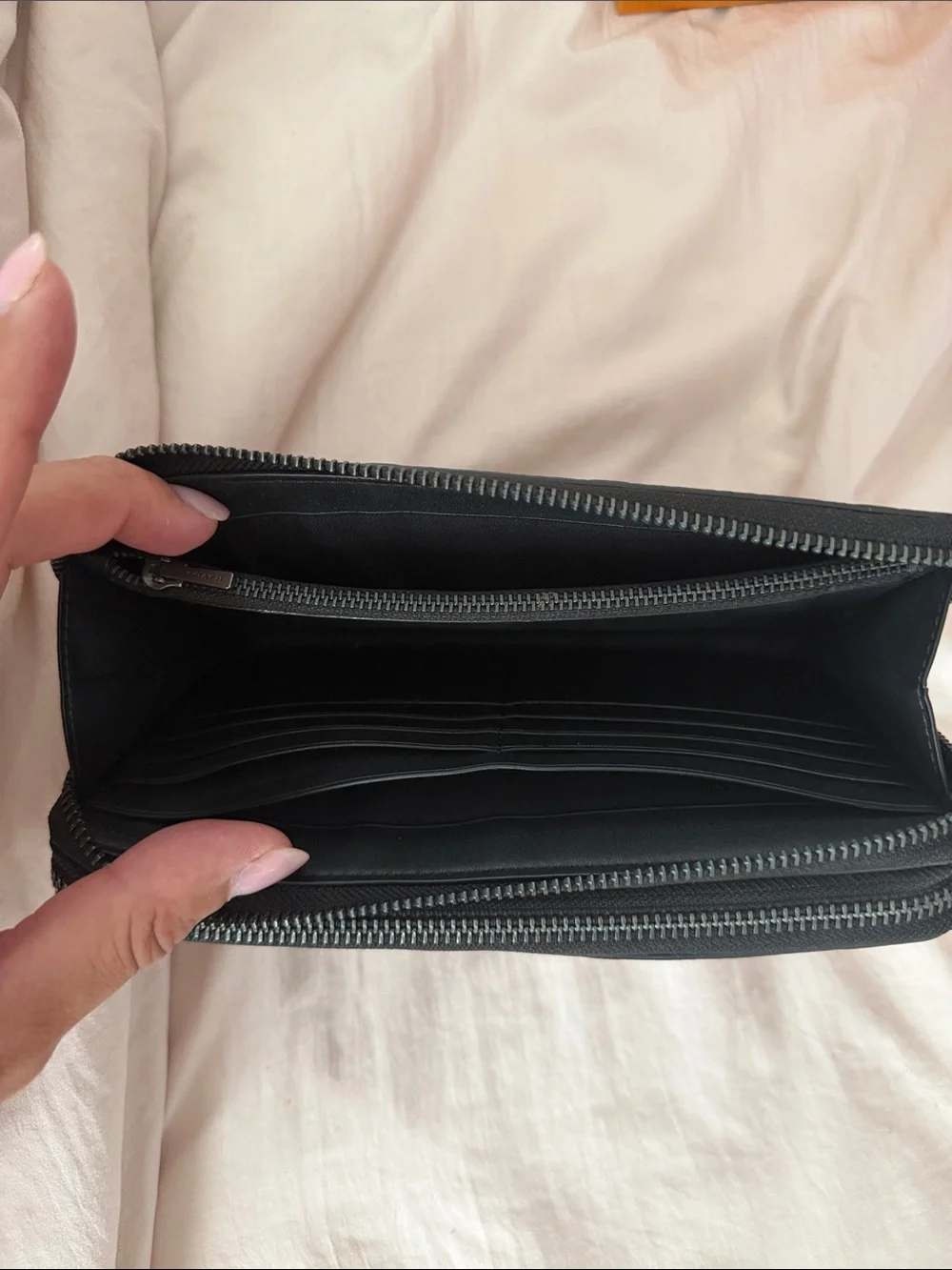 Coach Black Embossed Signature Wristlet men’s or women’s.